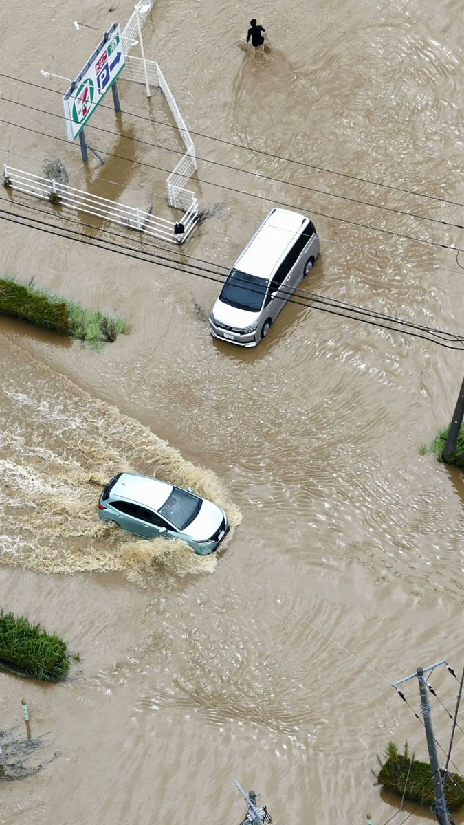 Record-breaking rainfall that pounded cities east of Tokyo overnight flooded roads and dozens of homes, stranded thousands of people, caused power outages and left at least five people dead and one missing.