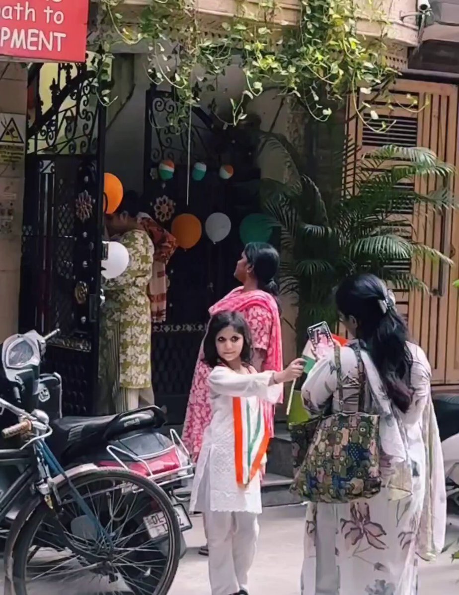 Grandfather seen taking grandson's photo with his keypad phone. The Kid is very lucky in every possible way.🥰
