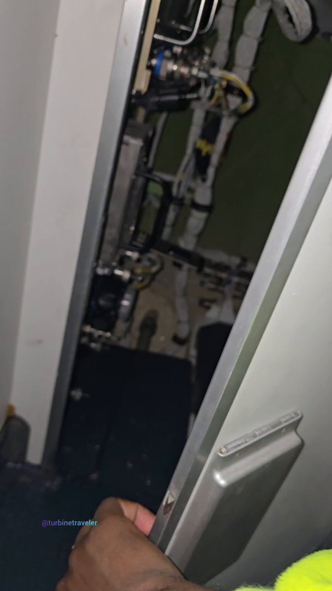 SO WE FLY INSIDE PRESSURE VESSELS... This is the rear pressure bulkhead of an aircraft — essentially the end of the pressurised section of the fuselage. The bulkhead consists of a dome and a ring that form its distinctive round shape to reduce areas of stress concentration (evenly distribute load). This video was captured from the rear galley. On the other side of the bulkhead is the unpressurised tail cone. That's the rear structure keeping the cabin pressurised at altitude.