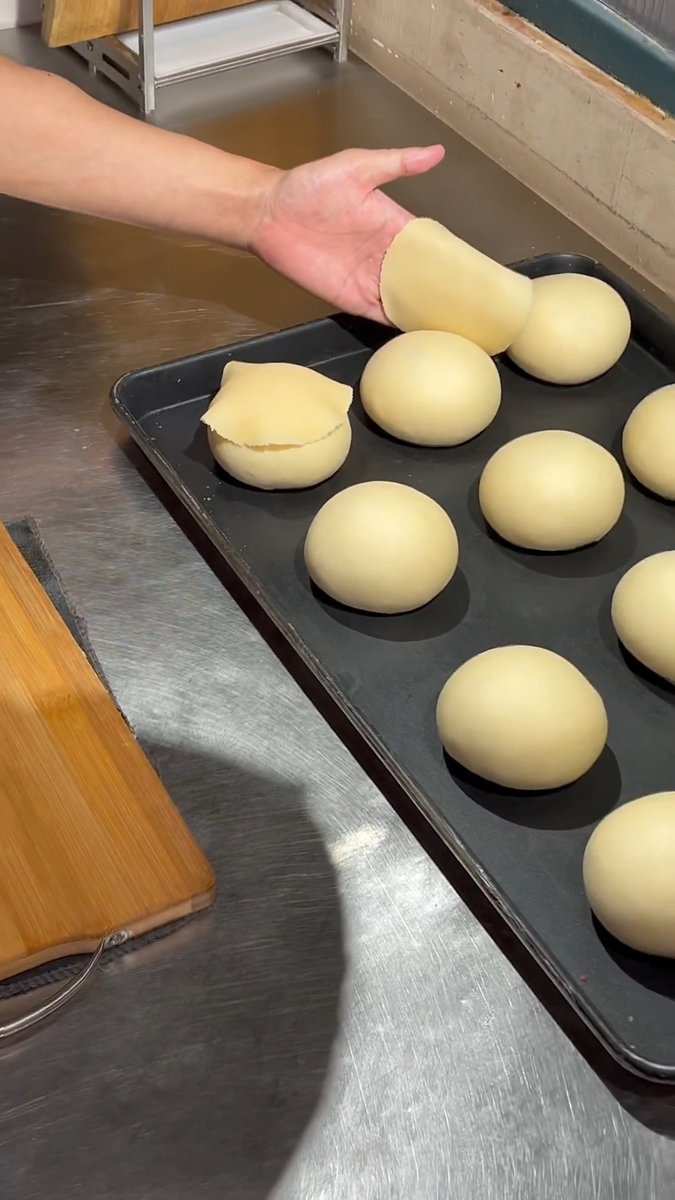Forget rolling pins—this guy just whipped out a kitchen knife to roll pastry dough. One second, one sheet. Smooth as butter.