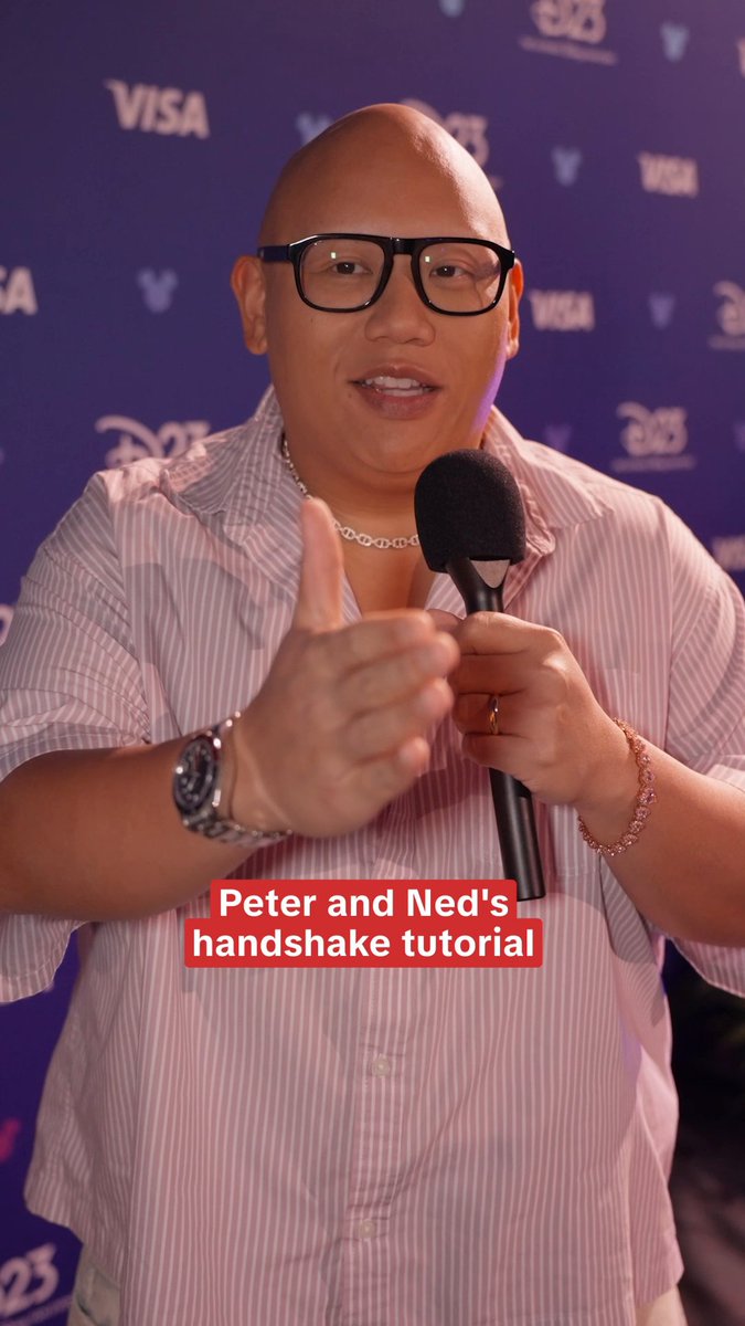 Jacob Batalon breaks down the Peter and Ned handshake at #D23. 🤝