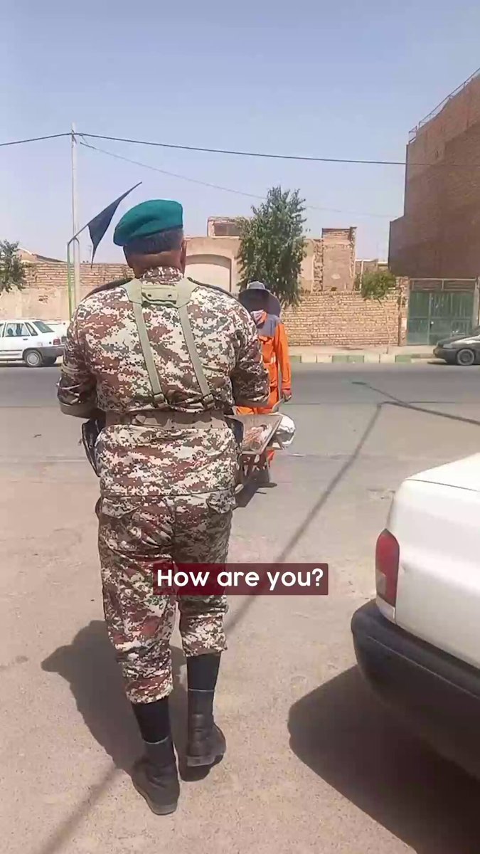This is how Iranian soldiers treat street cleaners working under scorching heat.