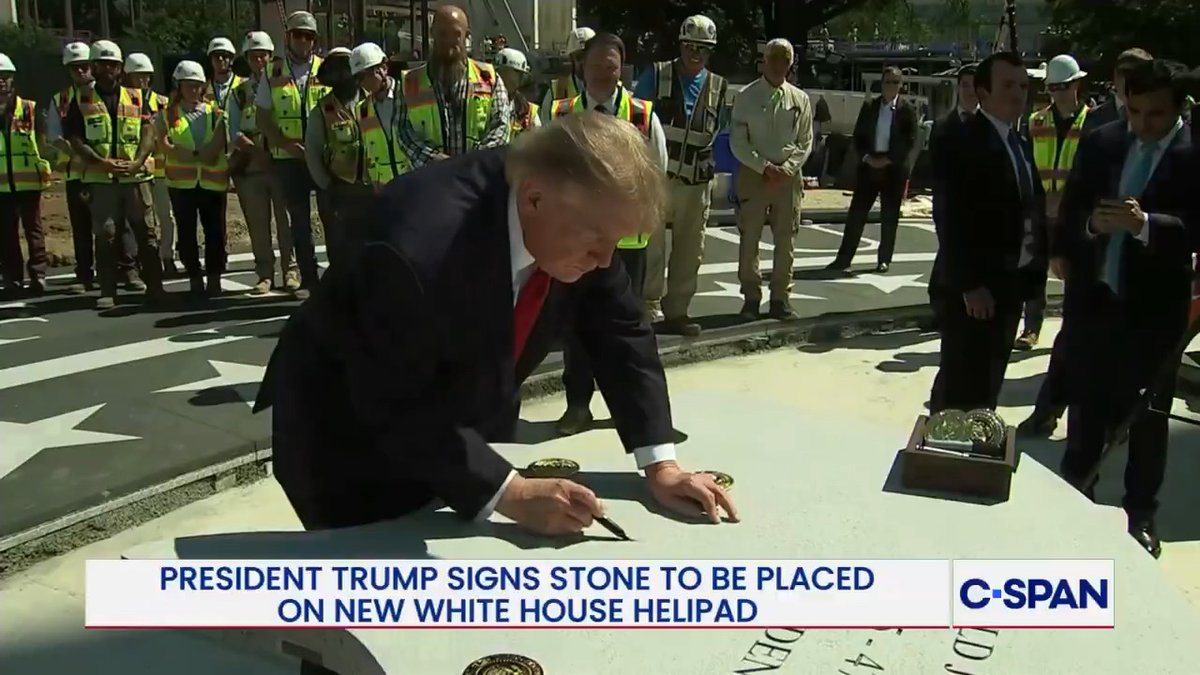 President Trump signs new White House helipad.