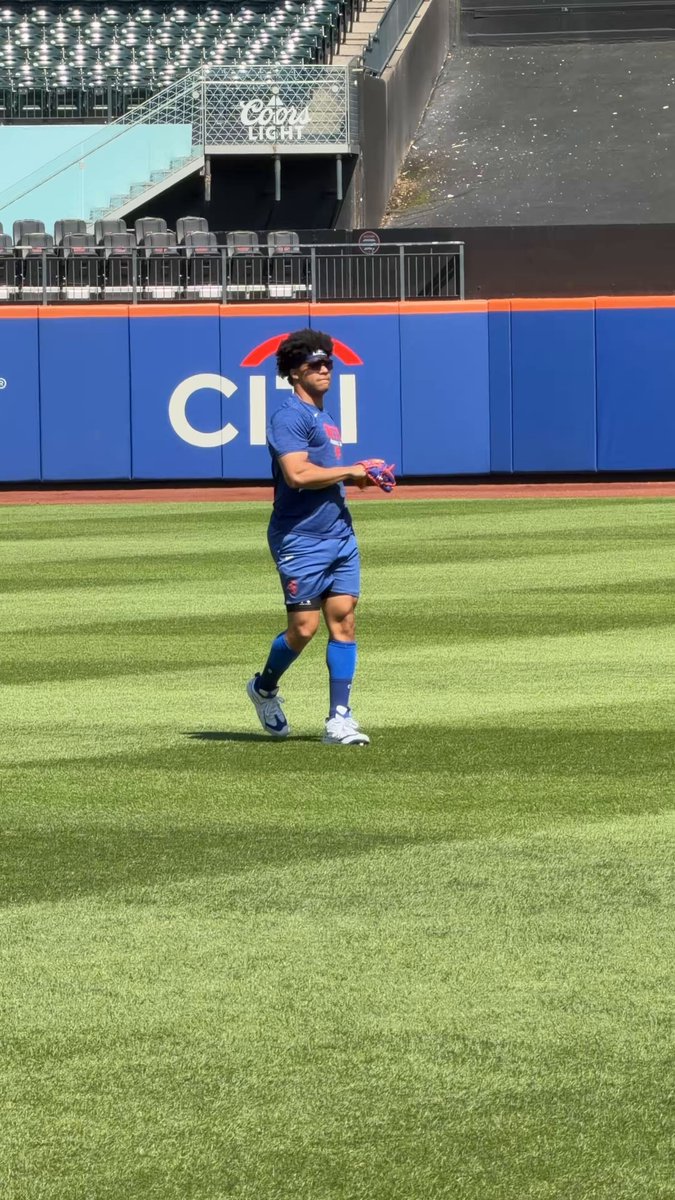 Juan Soto does some throwing pregame at Citi Field