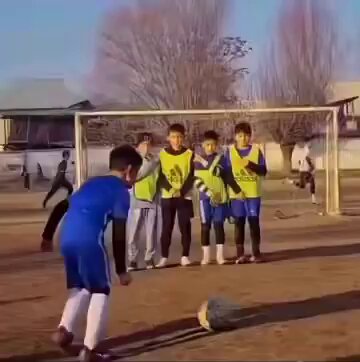 The greatest free kick of all time. Clever kid!