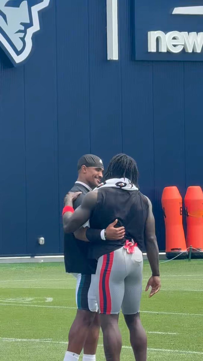 AJ Brown goes up to Jalen Hurts after practice The two hug and talk for a little