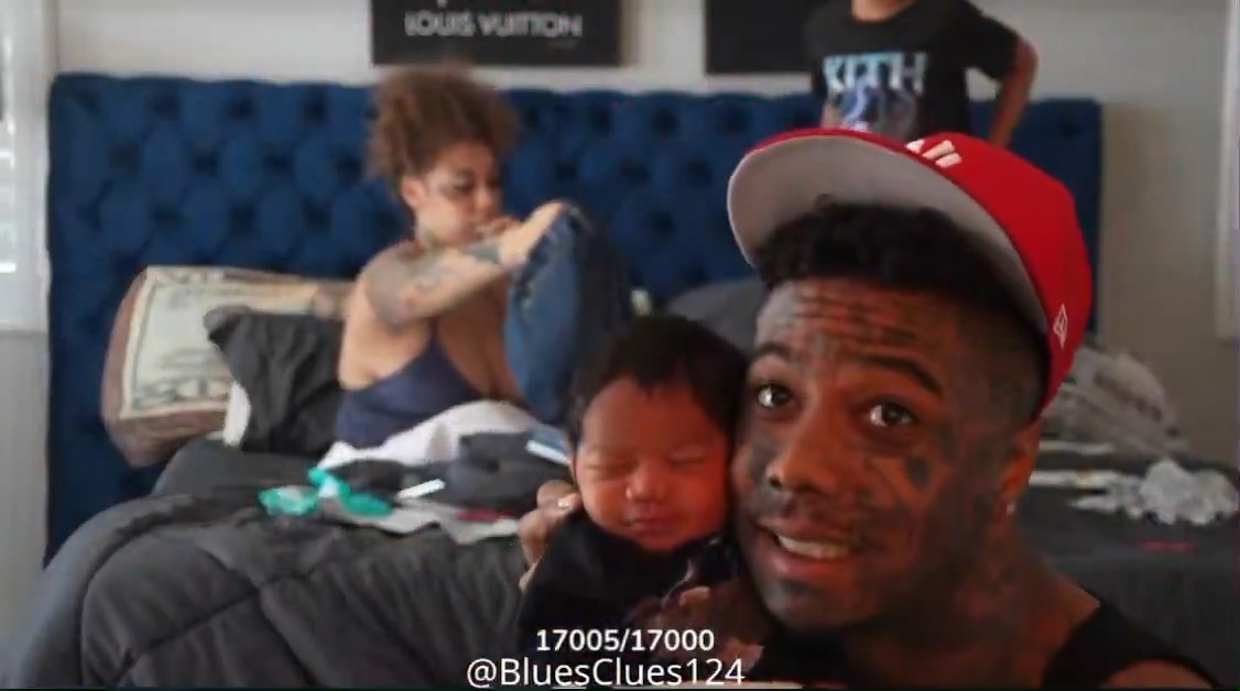 Blueface gives a closer look at his newborn baby Johnathan Jr. while trying to see if they resemble each other.