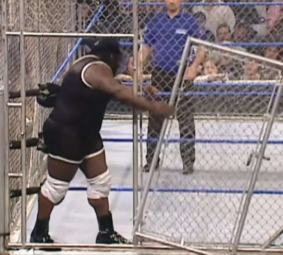 When the WWE production crew was supposed to saw off a bit of the masterlock to make it easier for Mark Henry to break the chain to the cage door They forgot to do so. Mark Henry legit used all his strength to break off the chain and the whole door HIMSELF 😭 UNREAL ATHLETE