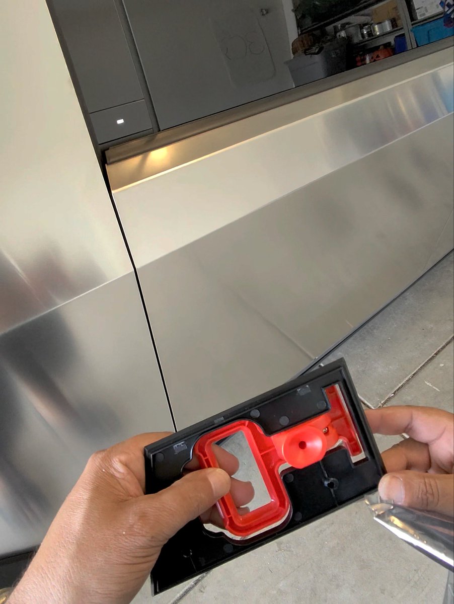 Installing emergency release handles on a cybertruck for the rear passengers