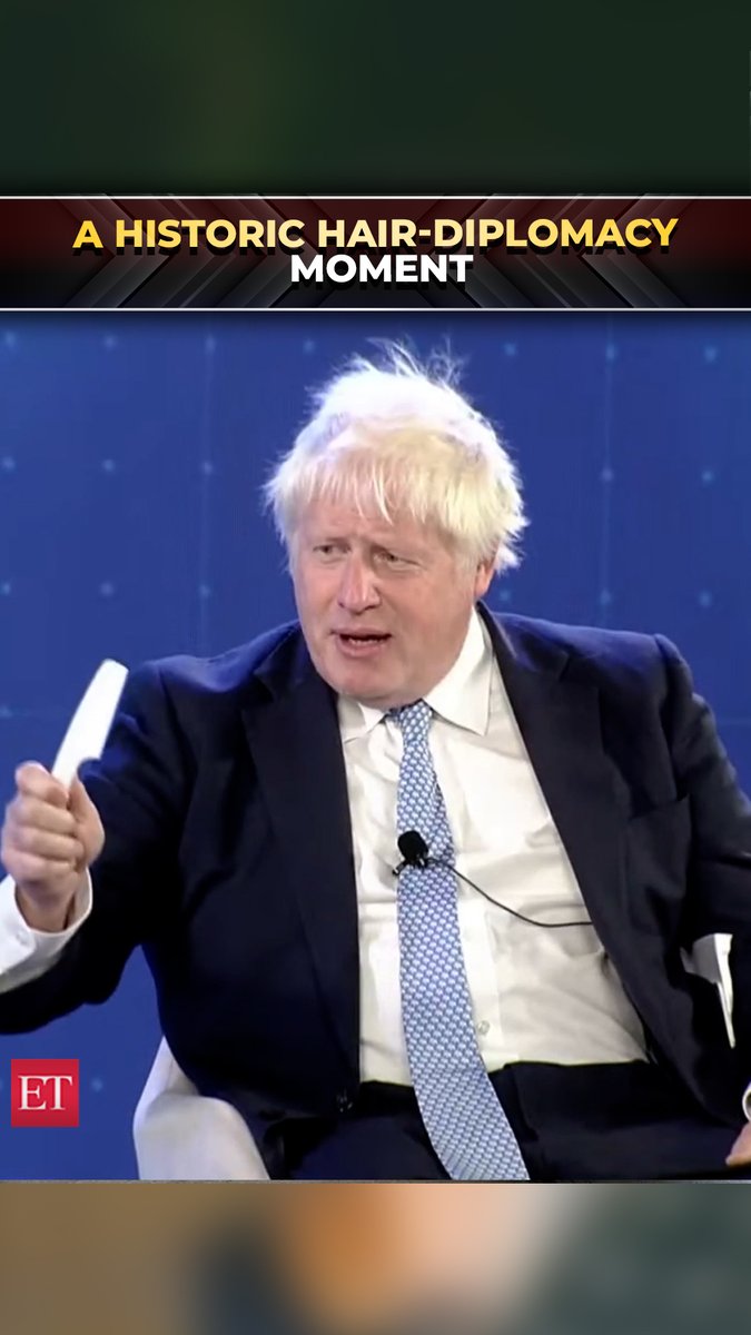 Ex-UK PM Boris Johnson jokingly combs his famously messy hair in front of an Indian audience “out of respect for India”