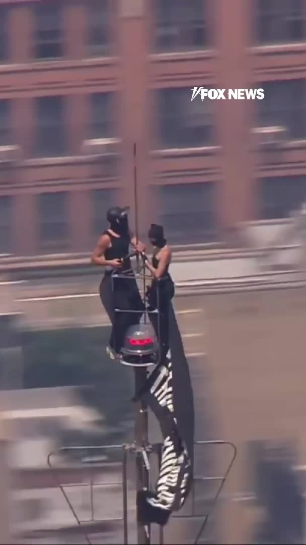 Empire State Building climbers Ivan Kuznetsov and Angelina Nikolau return to court in Manhattan courtroom their viral engagement stunt more than 1,300 feet above the city lands them in serious legal trouble. Prosecutors allege the couple broke a lock on a 104th-floor security door, entered restricted areas, and climbed all the way to the building’s broadcasting antenna on July 1. Now they’re facing charges including reckless endangerment, burglary and criminal mischief. Their attorney is pushing back, arguing the case is overcharged and that the stunt never put building occupants or visitors at risk.