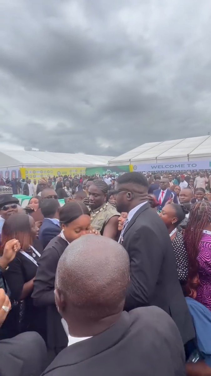 Nigerian lawyers struggle to take pictures with VeryDarkMan outside the venue of the ongoing NBA AGC 2026 in Rivers State.
