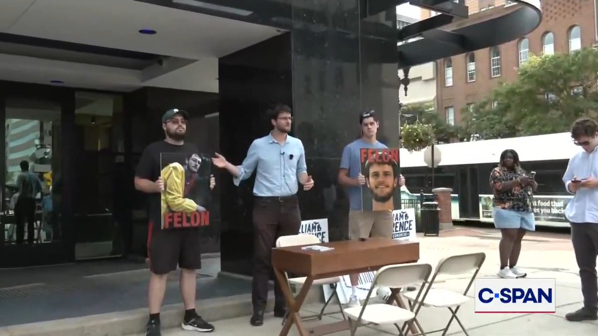 U.S. House candidate William Lawrence (D-MI) (William Lawrence) addresses protestors at a campaign event: "We're glad that people are out here participating in the democratic process... A dozen years ago, I took a stand to defend Michigan's water."