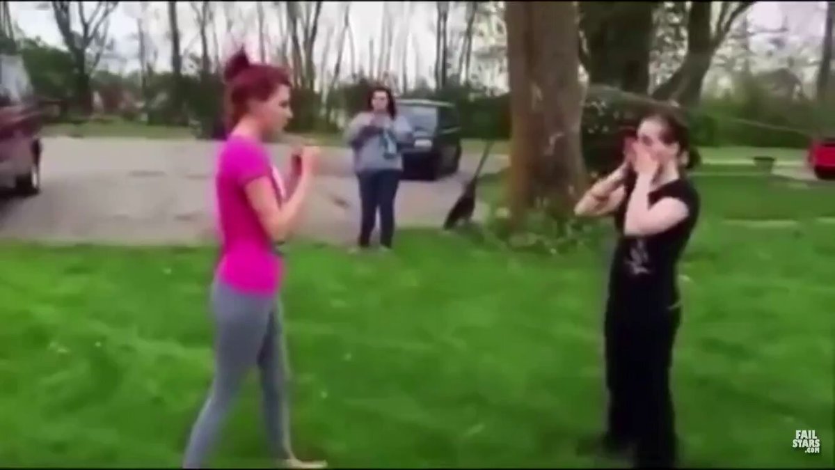 Girl Throws Shovel At Other Girl During Fight In Girls Yard