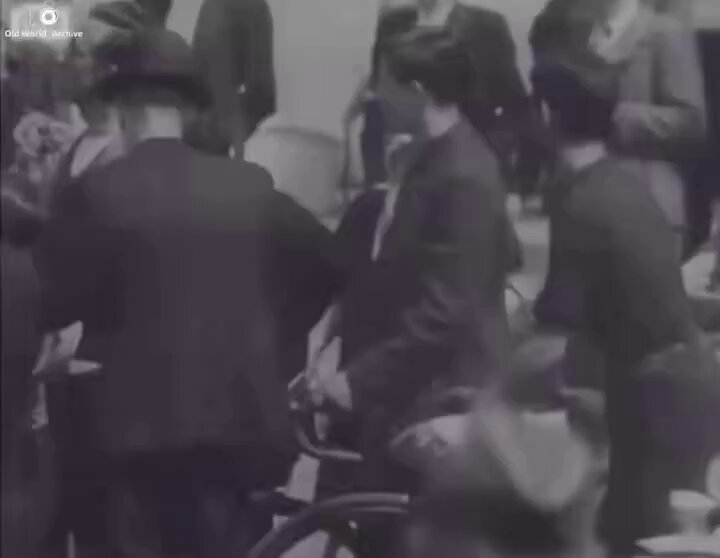 French people react as German troops enter Paris on June 14, 1940