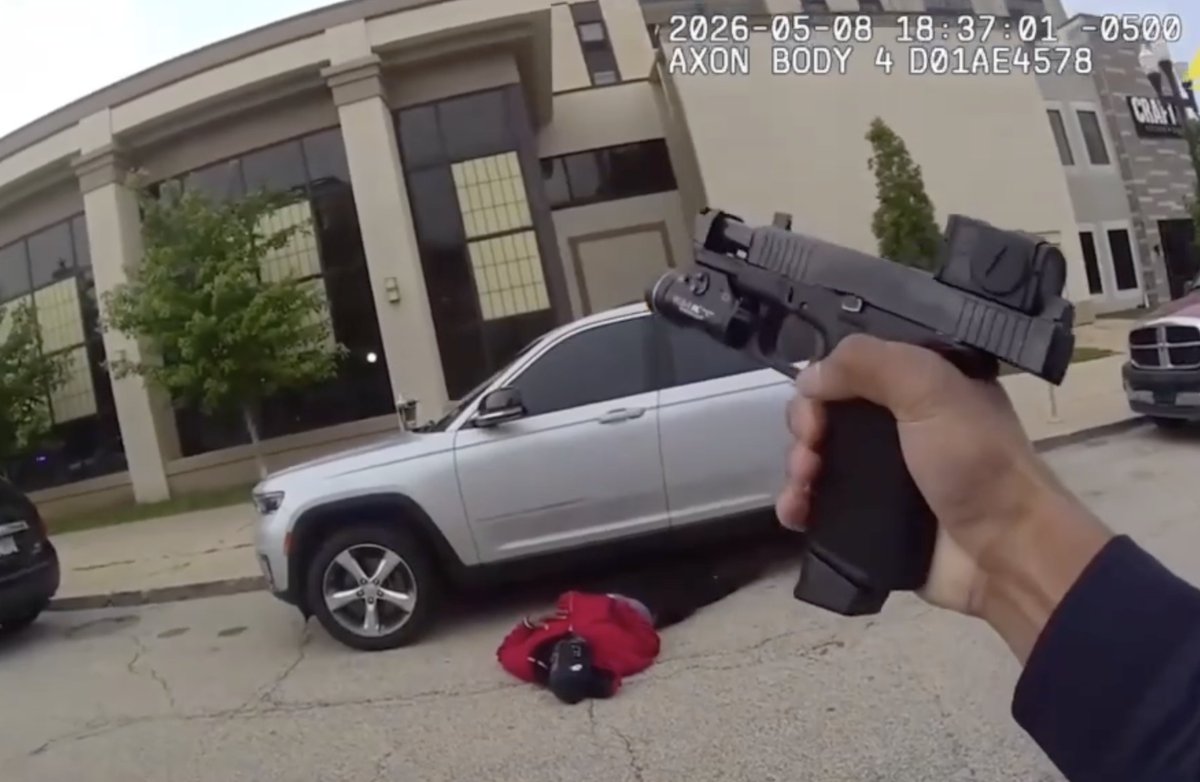 I missed this video yesterday and uhhhhhhhhhh, it's pretty freaking wild. If it didn't show two people dying it would almost be comical, no disrespect intended. The murderer dancing around, the cop wildly blasting one handed "break yo'self" style