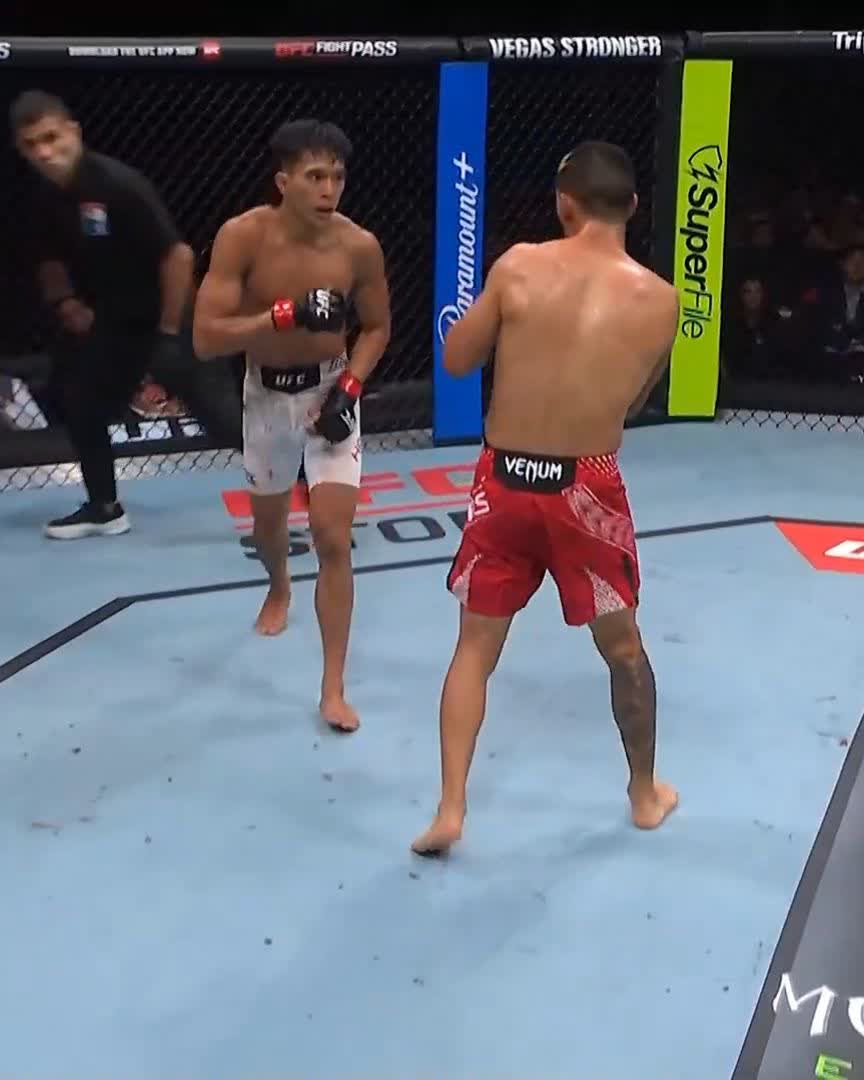 AS ADVERTISED 🇮🇩 Bilal Hasan gets the stunning KO in his UFC debut! [ #UFCShanghai is LIVE NOW on @ParamountPlus ]