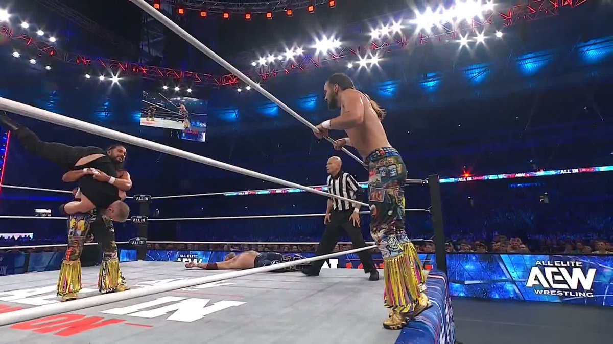 Cope and Cage with the tribute to the Hardy Boyz and Dudley Boys You love to see it #AEWALLIN