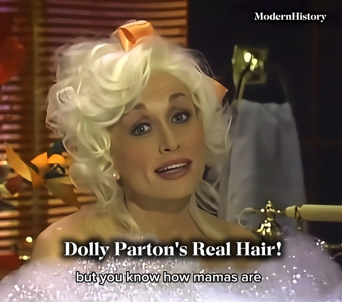 Dolly Parton on her ABC variety show Dolly, 1987–88, wearing her real hair instead of the famous wigs.