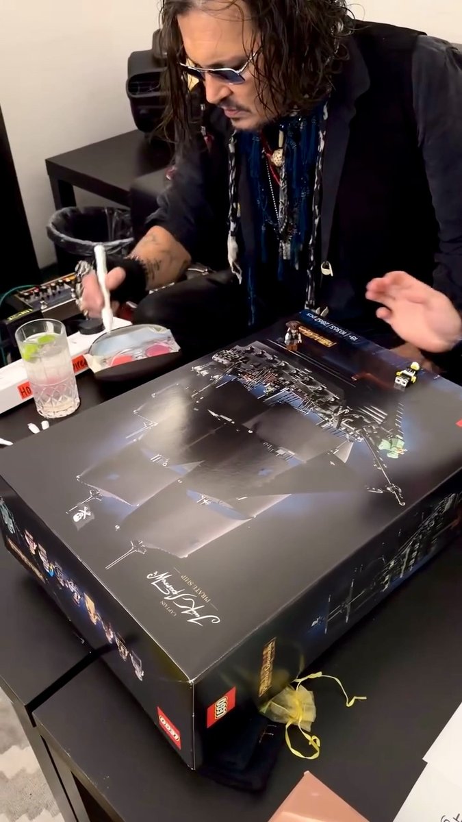 Johnny Depp just turned a LEGO Black Pearl set into one seriously valuable piece of Pirates of the Caribbean memorabilia ✨ The actor, 63, signed the item for celebrity coach Björn Schulz, who teased that the one-of-a-kind treasure will soon be up for grabs. “It’s a magnificent thing you’re doing here,” Johnny told Björn, who works with the WorldChanger Foundation to raise funds for youth mental-health and resilience programs 🏴☠️🤍 📽️: bjoern.schulz.personalcoach