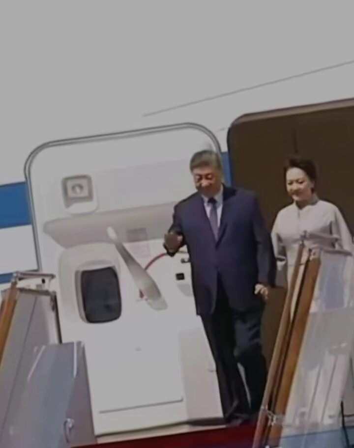 [ Margin Notes ] Xi Jinping is really sick, and it is not a mild case. On August 30 the “core” of the Chinese Communist Party stepped off his plane in Bishkek looking pale, puffy-faced and unsteady. Video that circulated outside the Great Firewall shows him gripping Peng Liyuan’s hand as if it were a banister. She, in turn, quietly slipped her arm under his. CCTV’s official footage jumps from a distant wave at the cabin door to a handshake on the tarmac. The stairs themselves vanished into the editing suite. The Party that never lies simply decided the public did not need to see its leader negotiate gravity. This is not an isolated clip. In 2022 he nearly missed a step in Kazakhstan. In 2023 South African footage of the same painful descent was also cut. Last December, walking down steps with Emmanuel Macron at Dujiangyan, Xi again used his wife as a walking stick, one leg dragging. The pattern is now a running gag among overseas Chinese: the man who demands “absolute loyalty” cannot be trusted to walk down a jetway without a spouse acting as human scaffolding. The regime’s response is always the same. State television airbrushes the stumble, Xinhua prints poems about “golden periods” and “shared futures,” and anyone who notices the tremor or the swollen features is accused of “smearing China.” Meanwhile the only remaining deputy director of the Central Health Commission, Zeng Yixin, is a career oncologist. Coincidence, the Party insists. Just as it is coincidence that the same man who once strode across stages now blinks rapidly, speaks in a thin voice, and lists to one side. A system built on the myth of an infallible helmsman cannot admit the helmsman is listing. So the cameras are positioned, the scissors come out, and the first lady is quietly recast as a discreet nurse. The same Party that lectures the world on “national rejuvenation” cannot even let its own people see their leader walk down a set of stairs. That is not strength. That is a regime terrified of its own mortality, and of the day the video can no longer be cut. — Aric