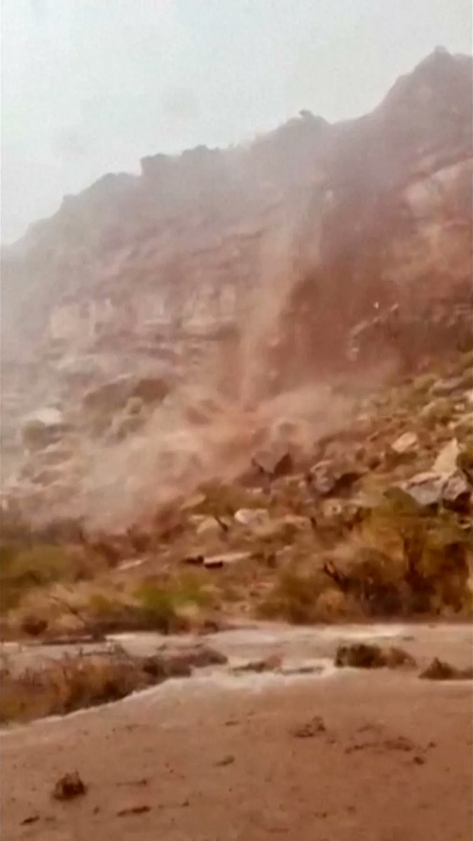 Dramatic video shows a rapid, muddy waterfall pouring down a Zion National Park cliffside in Utah on Monday. A flash flood warning was issued by authorities.