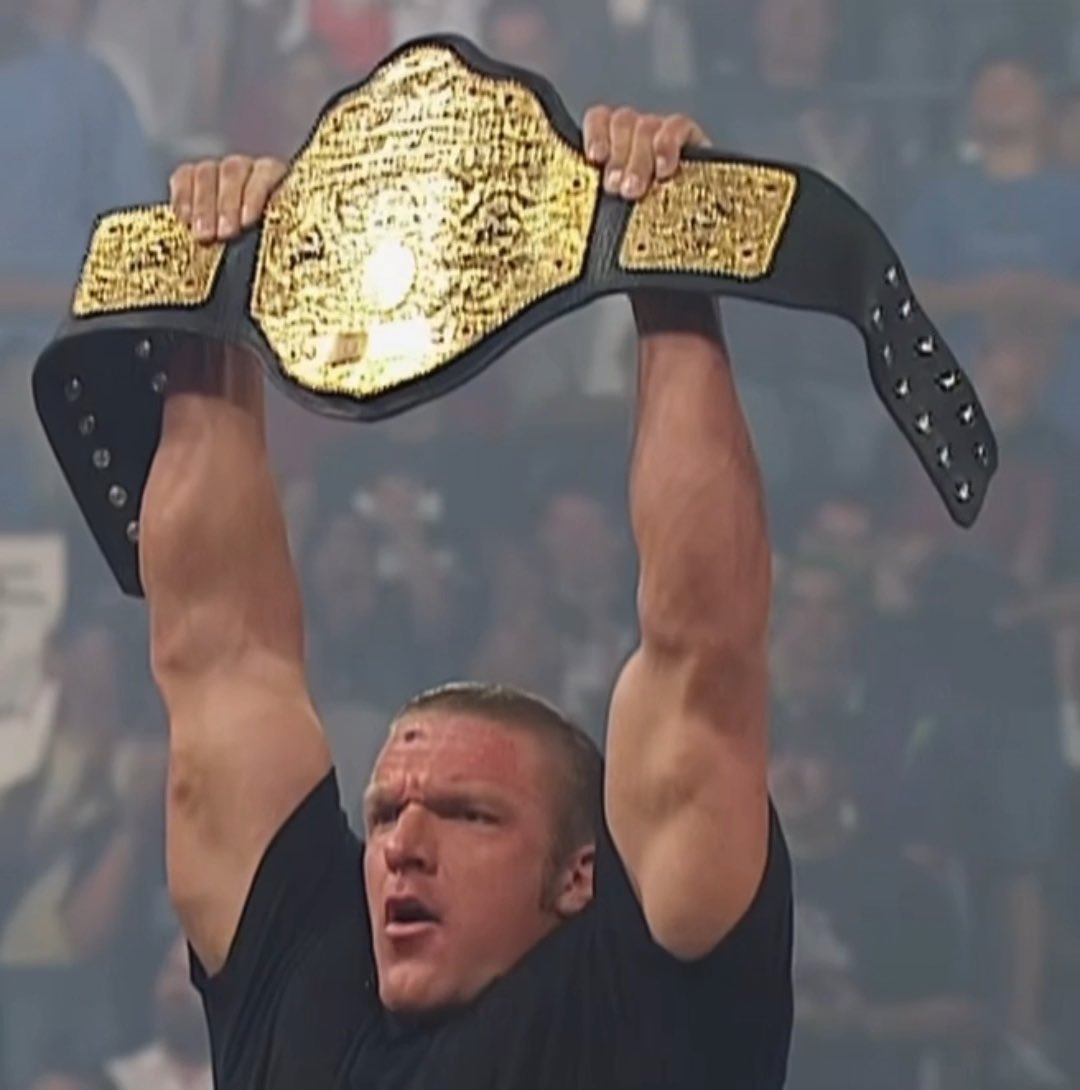“LADIES AND GENTLEMEN YOUR WORLD HEAVYWEIGHT CHAMPION, TRIPLE H” The official start of the “Reign Of Terror” 40 plus successful title defenses. (2002)