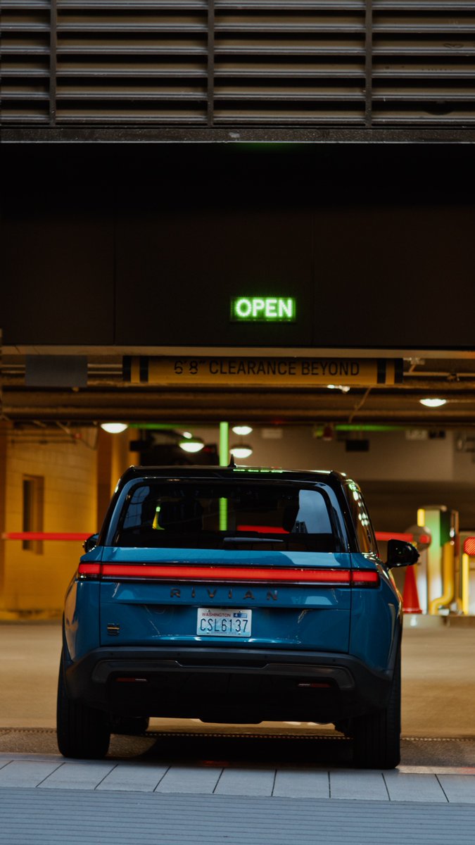 For those "watch your head" moments, just ask Rivian Assistant to drop it low and cruise under smoothly.