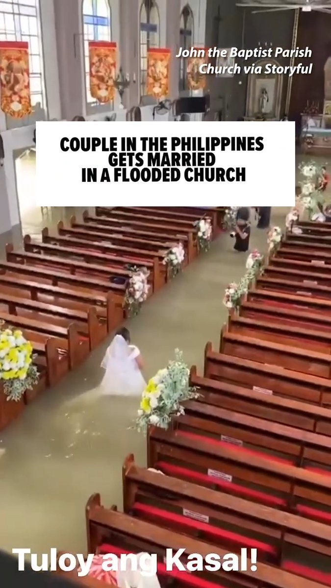 💒🌊 Footage from St. John the Baptist Parish Church in Bulacan captures the less-than-ideal conditions in which this Philippines couple decided to tie the knot. 🎥: St. John the Baptist Parish Church via Storyful