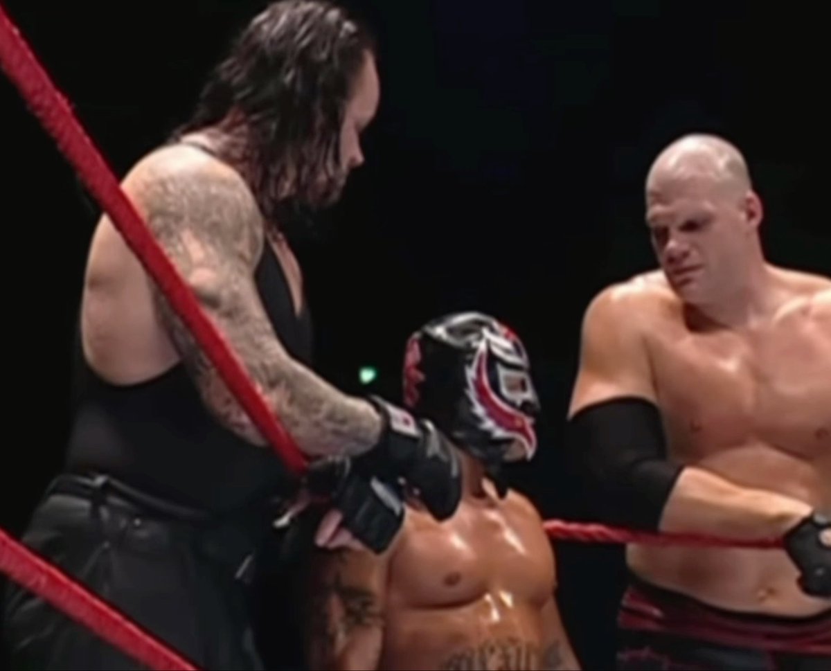 THE WAY KANE AND UNDERTAKER WERE STARING AT REY MYSTERIO HERE 😭 House shows used to be insane look at all the star power inside the ring. Eddie Guerrero Rey Mysterio Kurt Angle Edge Kane Undertaker (2005)