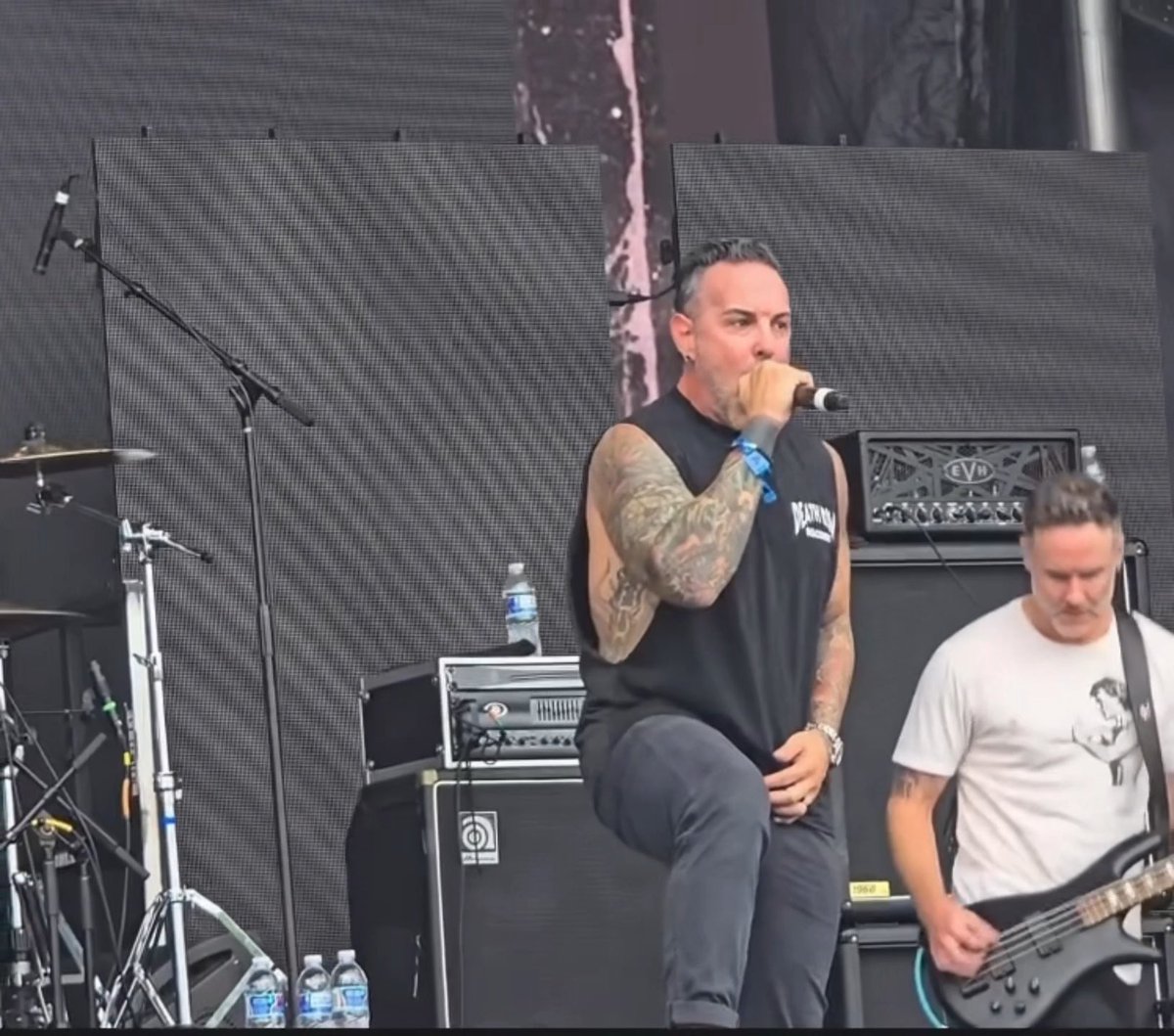 The band “Rev Theory” performed Randy Orton’s iconic theme song ‘VOICES’ while in the rain. THIS PERFORMANCE WAS AMAZING 🔥