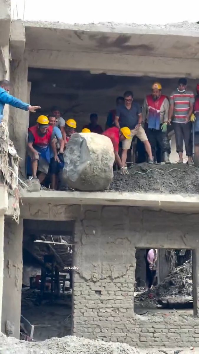 This massive boulder is so heavy that it takes nearly ten men to move it. Now imagine the force of the flash floods in Nepal that carried a rock like this straight into someone's home.