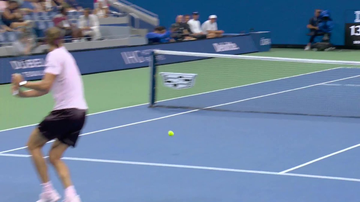 How does Halys do this? He some how flicks the backhand lob over Zverev!
