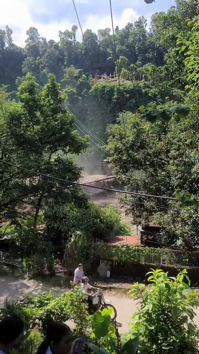 This is the moment Trishuli's old bridge collapsed after powerful flash floods swept through Nepal.