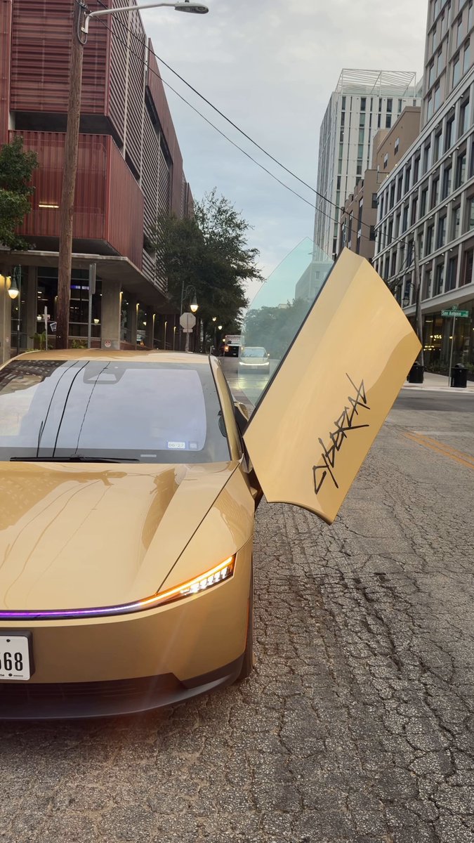 This is what the streets are going to look like. Tesla is going to flood cities with these things. Cooler roads. Safer transportation. No steering wheel. No pedals. Just futuristic cars moving people around on their own. We’ve talked about this future for years. Now I’m standing here watching it pull up in front of me. The future has arrived.