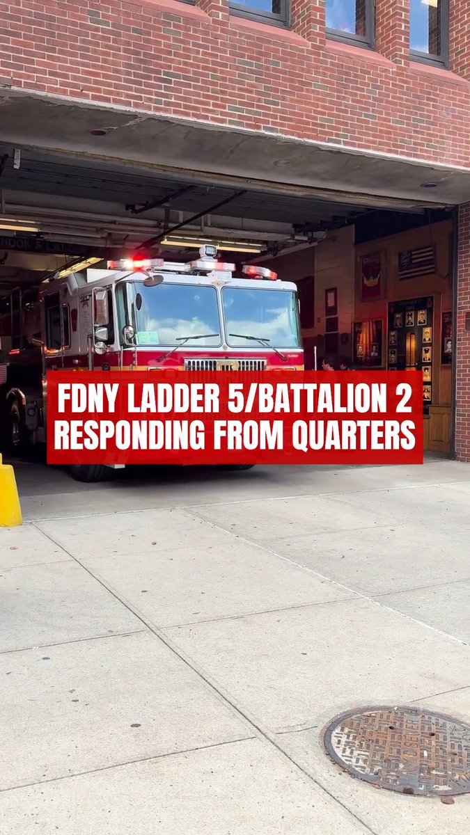 FDNY Ladder 5/Battalion 2 responding from quarters on Sixth Avenue in Manhattan