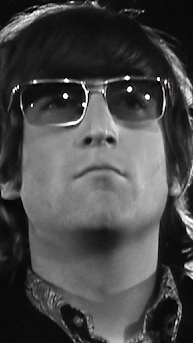 Elvis on the couch. The Beatles in the room. A meeting of musical worlds.