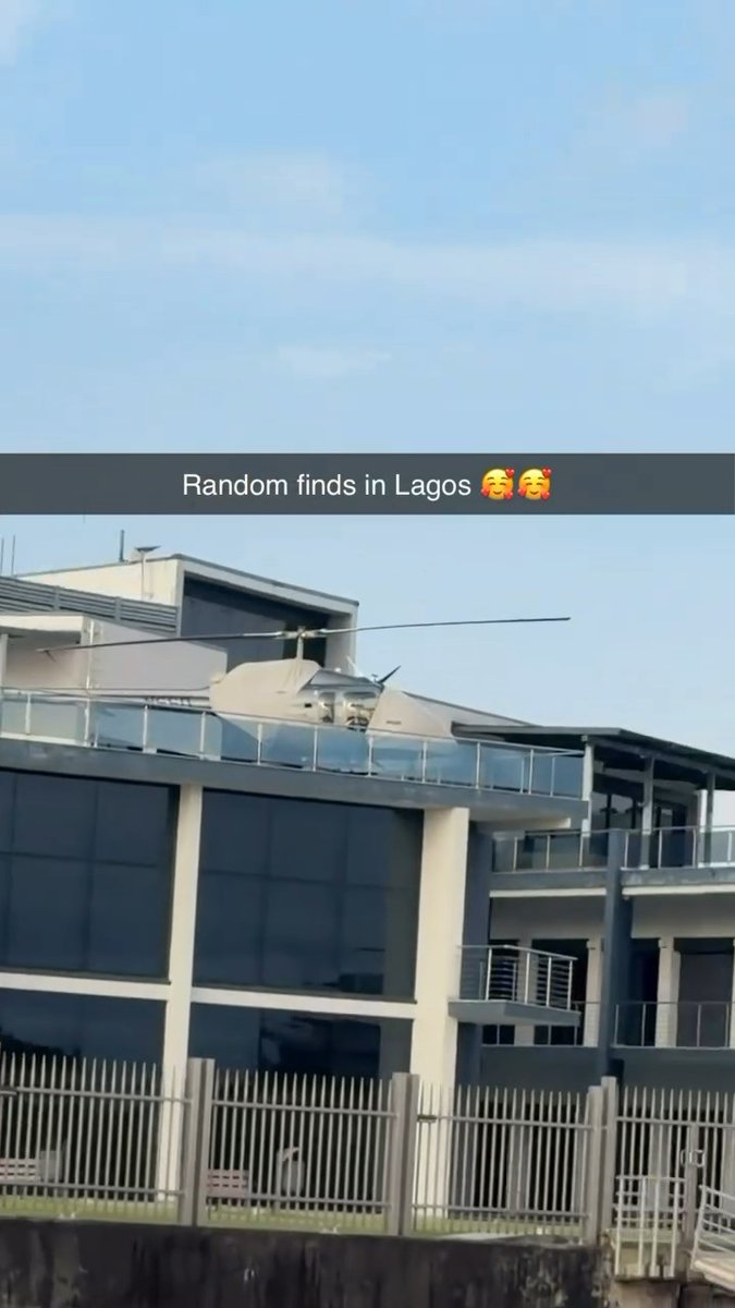Lady left stunned after spotting a private helicopter on the rooftop of a luxury home in Lagos