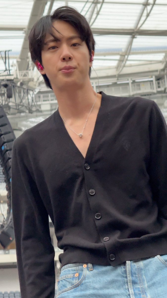 JIN LOOKING AT THE CAMERA 🫪
