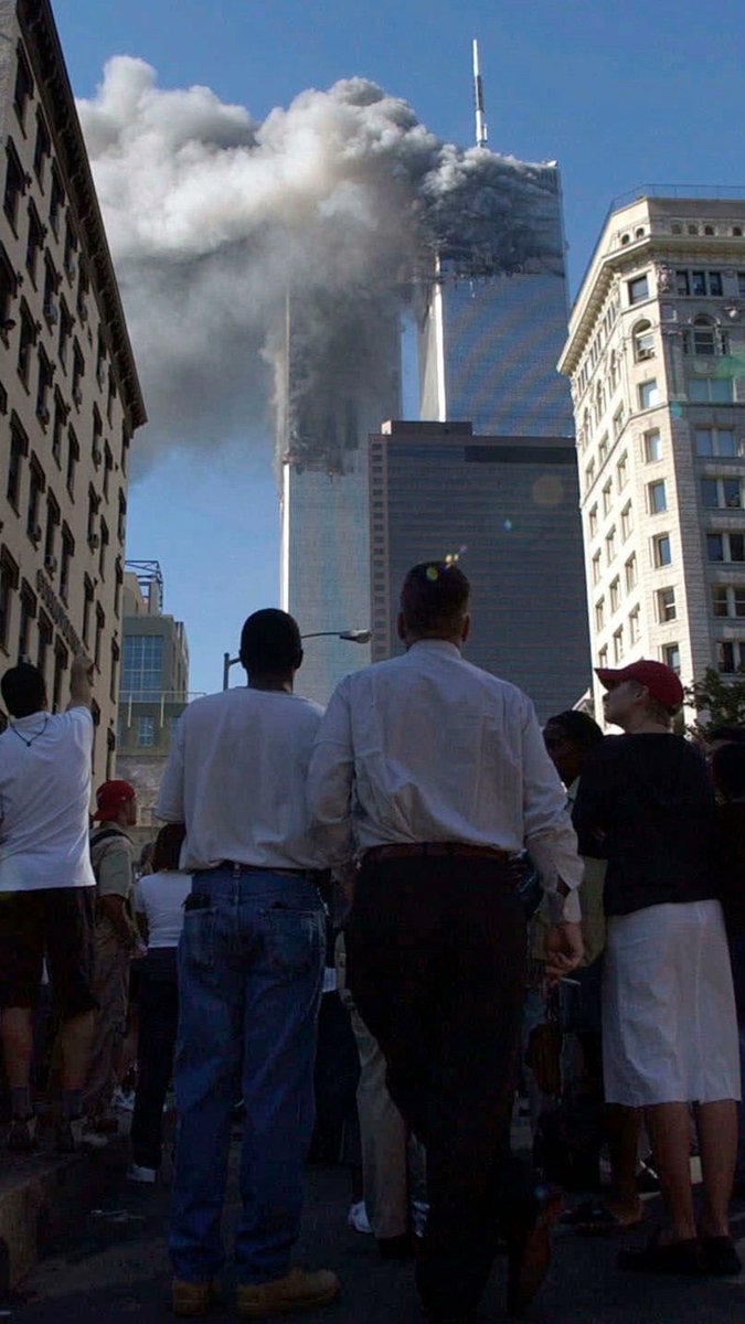 AP photographer Amy Sancetta stuck around for a few days to meet up with friends in New York after covering the U.S. Open tennis tournament on Sept. 9, 2001. Two days later, she received a call from one of AP's photo editors, rushed out of her hotel room and recorded history.