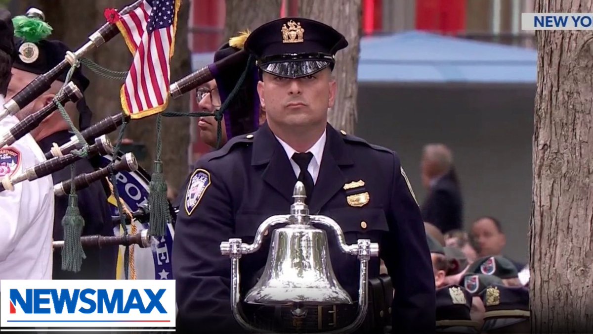 A moment of silence was observed and a bell tolled at Ground Zero to mark the moment American Airlines Flight 11 struck the North Tower of the World Trade Center on Sept. 11, 2001.