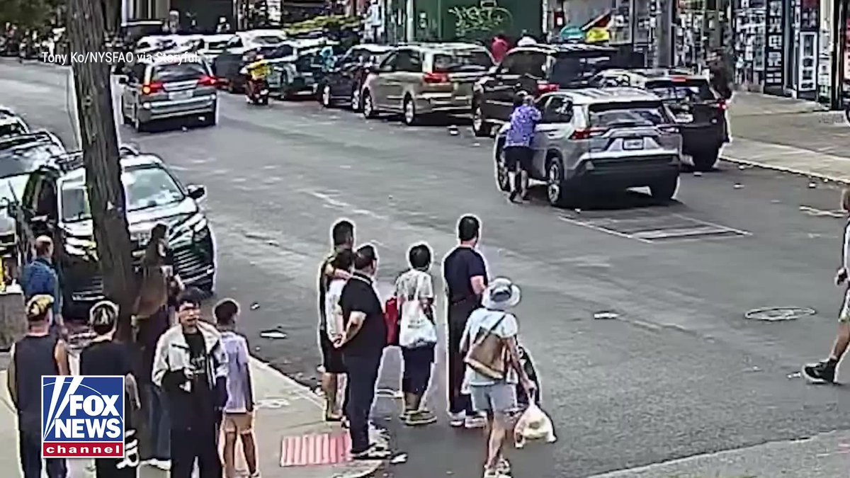 WATCH: An off-duty NYPD officer races into action after spotting an unconscious driver rolling through a busy Brooklyn intersection. Surveillance video shows the SUV run a red light, stop in the middle of the road and repeatedly roll forward as the driver suffers an apparent medical episode. The officer manages to intervene before anyone else is hurt. Councilwoman Susan Zhuang says his quick thinking likely saved the driver, pedestrians and others nearby.