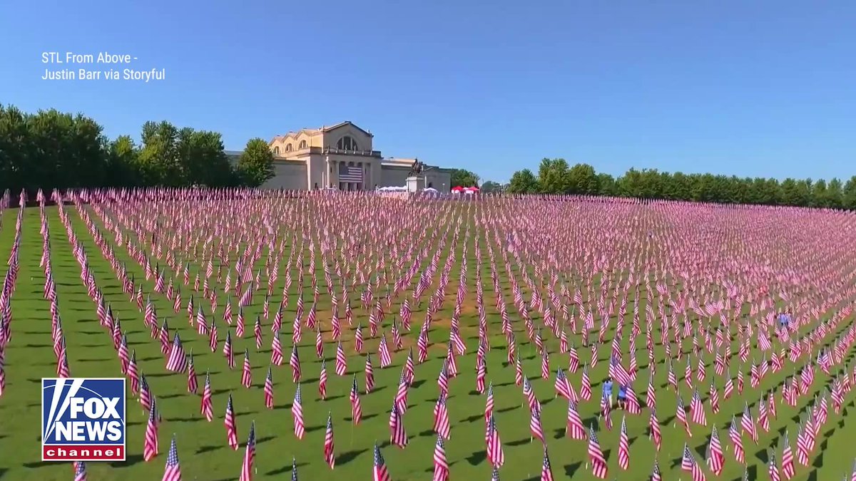 More than 7,500 American flags now cover Art Hill in St. Louis, transforming the landmark into a powerful tribute as the nation marks the 25th anniversary of 9/11. Volunteers planted each flag across the hillside and attached tags honoring those killed in the terror attacks. From above, thousands of flags fill the hill in red, white, and blue.