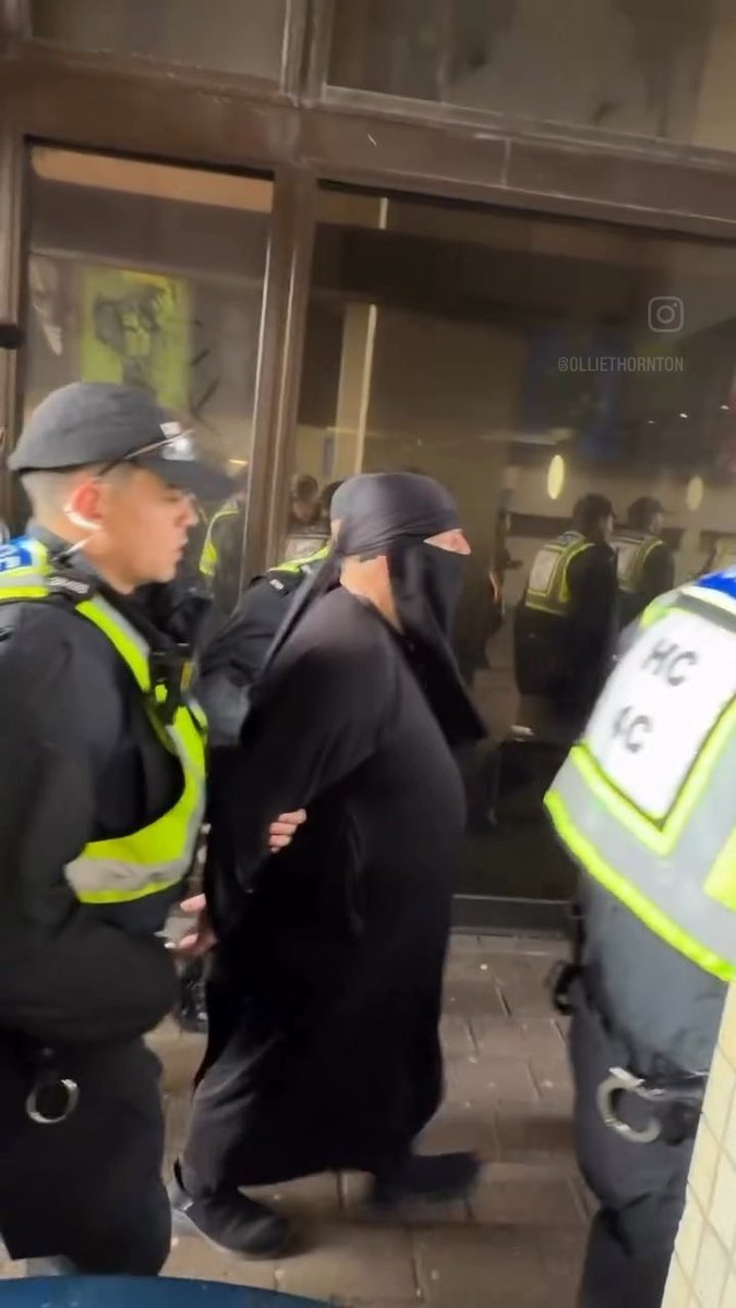 🚨76 year old arrested in Portsmouth after wearing full niqab at protest A man claiming to be a gender-fluid Muslim convert turned up in a niqab at Saturday’s protest. Police had already banned face coverings to conceal identity and said the rule would apply equally. He was arrested. The law includes a later defence for genuine religious coverings, but officers can still require removal or arrest first. Expect the same power at future protests. Anyone concealing their face in a designated zone - balaclava, mask or niqab can be asked to uncover. How consistently police apply it will decide whether this stays equal or becomes selective. Credit: @0lliethornton on IG