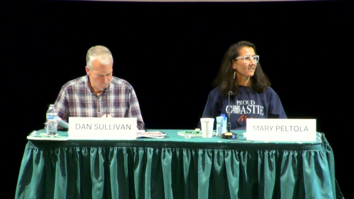 Republican incumbent Sen. Dan Sullivan forgets his policy stance during a debate and looks to his opponent Mary Peltola for guidance, copying her answer.