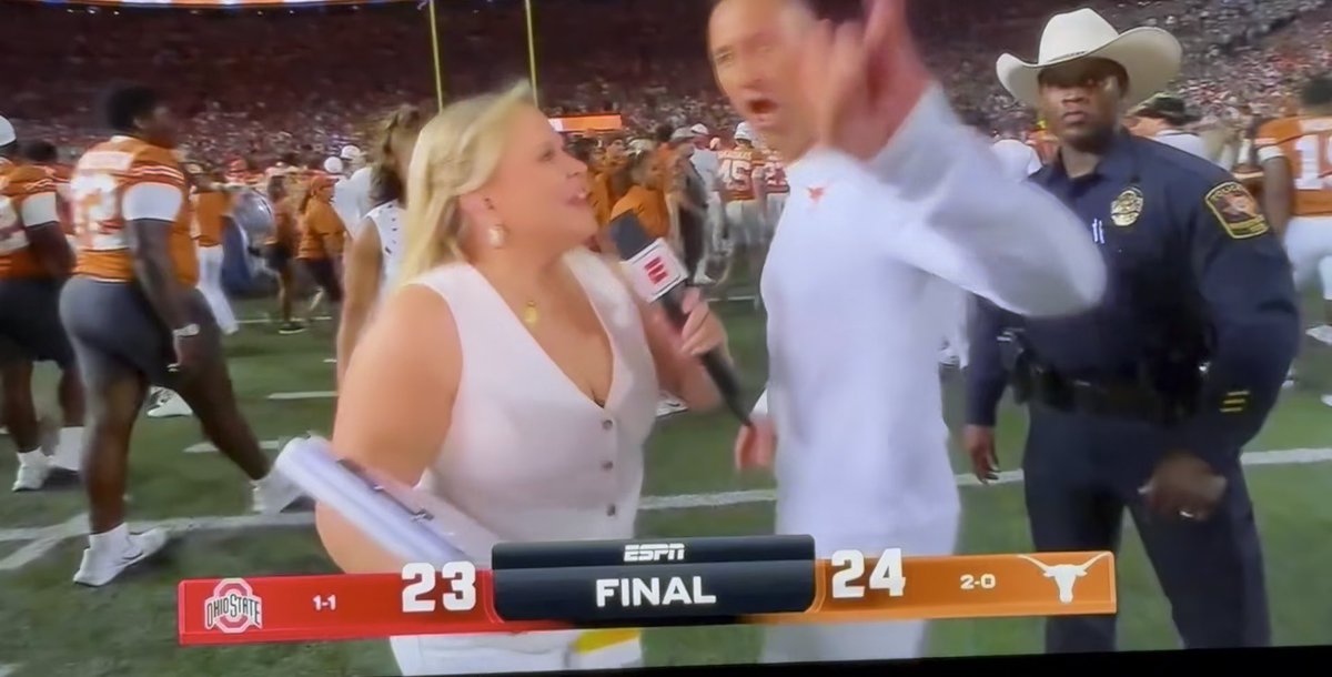 Watch Texas Longhorns coach Stephen Sarkisian shit canned the chubby ESPN reporter after the game trying to get an interview and she got furious and rolled her eyes and stomped off.