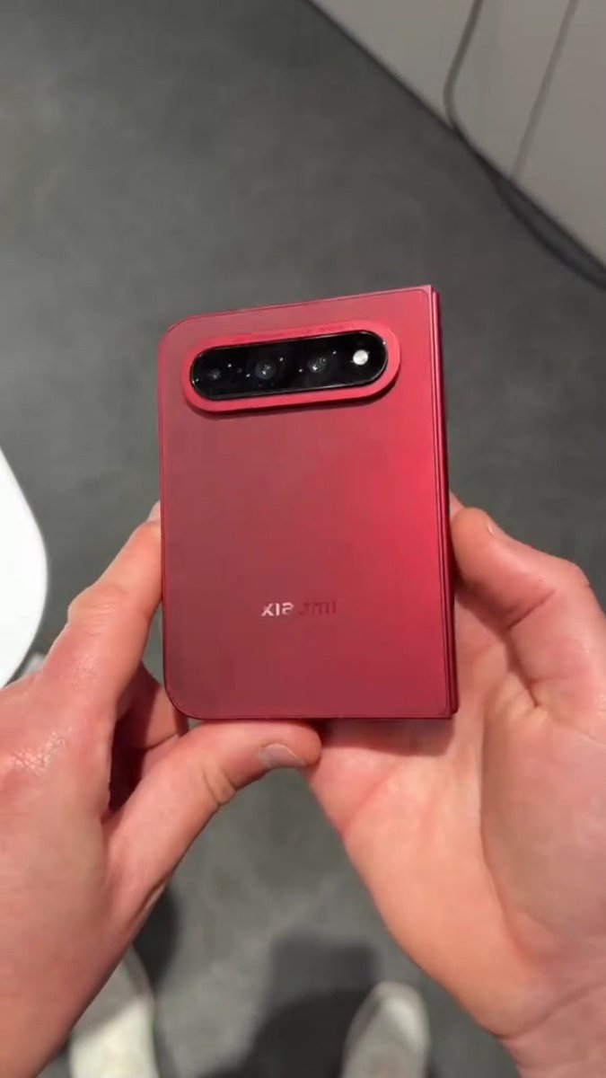 Xiaomi 18 Fold. This Burgundy look is insane.🤯 I'm cancelling my Apple iPhone Duo pre order.