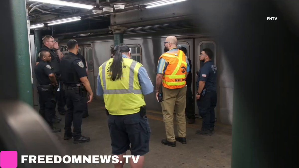 A couple sitting on the tracks at Manhattan’s Spring Street station was struck and killed by a southbound 4 train Sunday.