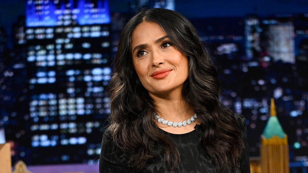 .Salma Hayek surprises Jimmy with an early birthday cake and shows him her La Mordida birthday tradition 😭 #FallonTonight