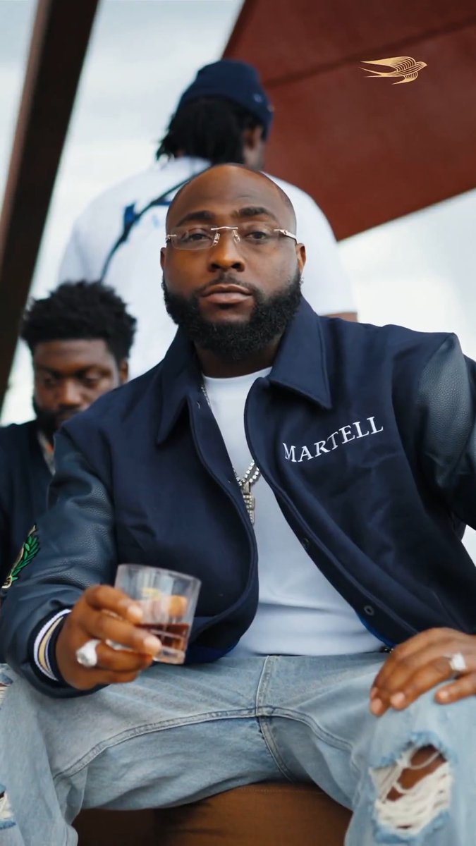 🚨 Davido &amp; his crew in Martell’s new wearables, designed by Creèr Magnus. 🥃🧥